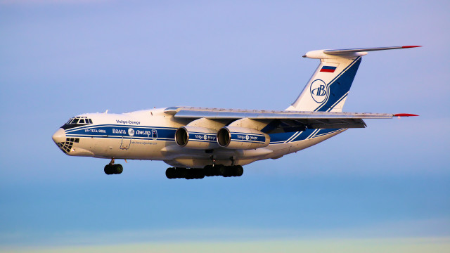 Large jetliner landing gear tiltshift free wallpaper - medium preview image