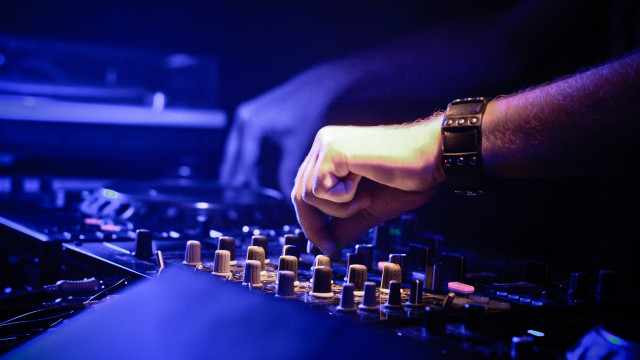 Dj mixing blue light hand free wallpaper - medium preview image