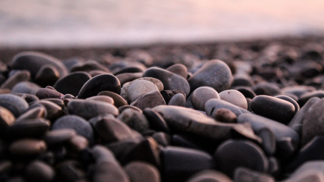 Rocks beach ocean shallow depth free wallpaper - medium preview image