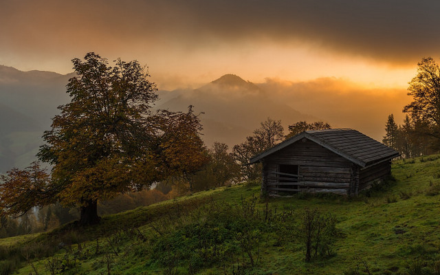 Small cabin grassy hill mountain free wallpaper - medium preview image