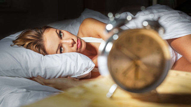 Woman bed alarmclock whitepillow sheets free wallpaper - medium preview image