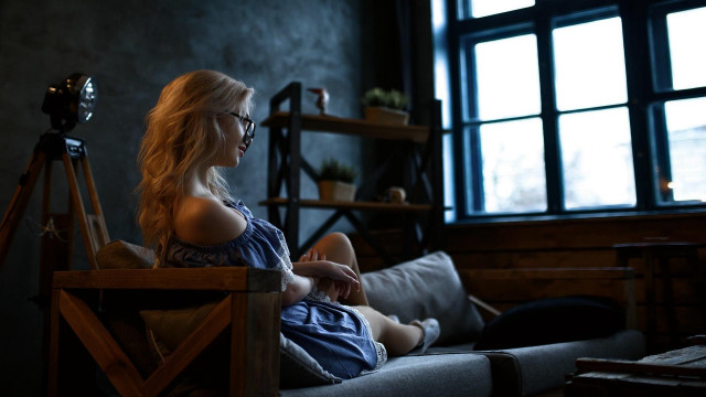 Woman sitting chair window camera free wallpaper - medium preview image