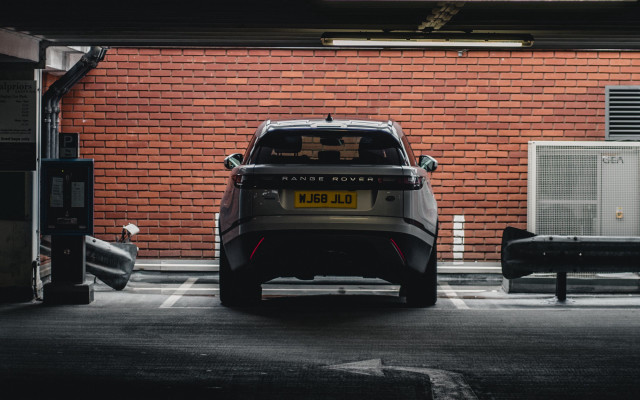 Car parking lot brick wall free wallpaper - medium preview image