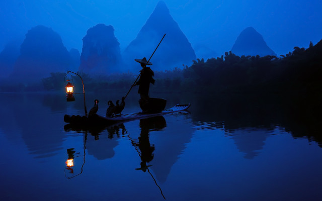Man boat lantern mountains fog free wallpaper - medium preview image