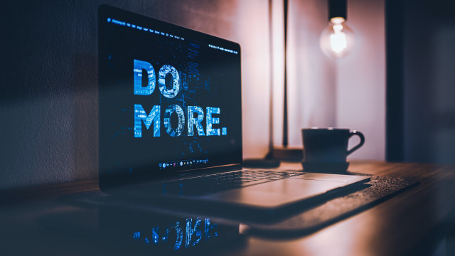 Laptop coffee lightbulb wooden desk free wallpaper - medium preview image