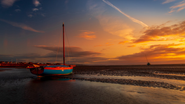 Beach sunset boat sailboat lighthouse free wallpaper - medium preview image