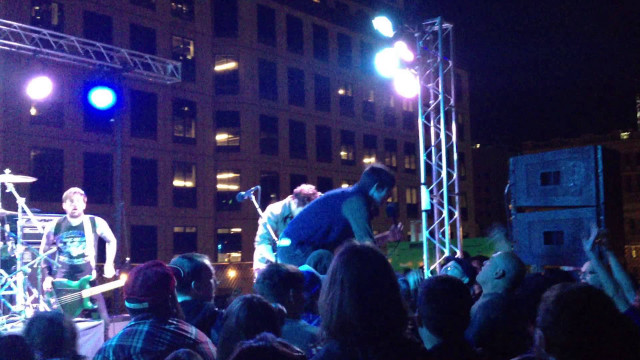 Band performance night city square free wallpaper - medium preview image