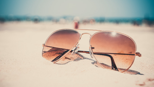 Sunglasses beach sand ocean sunset free wallpaper - medium preview image