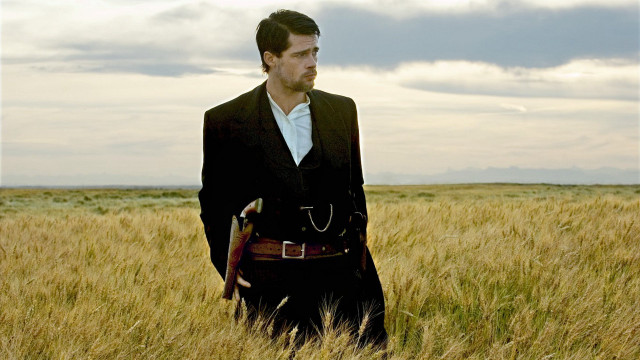 Man suit field grass gun free wallpaper - medium preview image