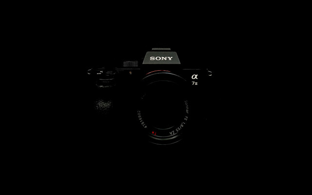 Dark camera lens flash photorealism free wallpaper - medium preview image