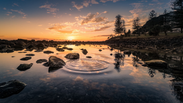 Sunset lake rocks tree clouds free wallpaper - medium preview image