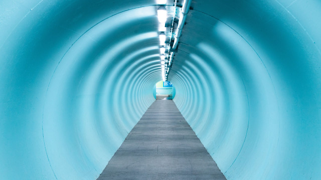 Long tunnel walkway blue light free wallpaper - medium preview image