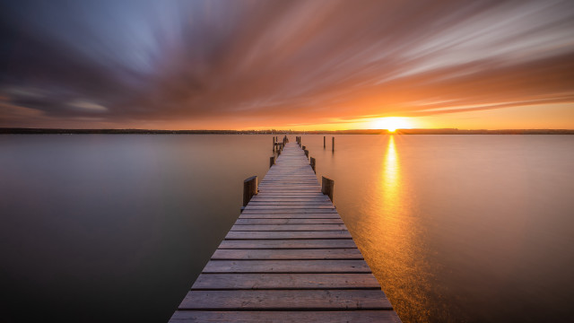 Sunset dock pier ocean reflection free wallpaper - medium preview image