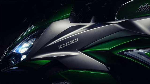 Motorcycle green black headlight deconstructivism free wallpaper - medium preview image