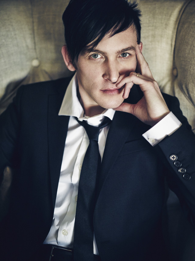 Man suit tie couch cellphone free wallpaper - medium preview image