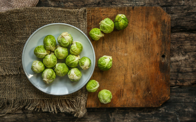Brussel sprouts bowl wooden table free wallpaper - medium preview image