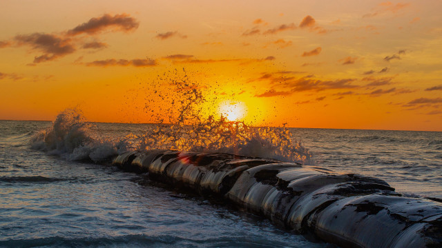 Large pipe ocean sunset water free wallpaper - medium preview image