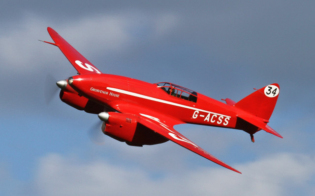 Red fighter jet cloudy sky free wallpaper - medium preview image