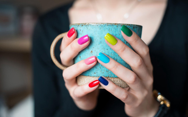 Woman colorful nails ring closeup free wallpaper - medium preview image
