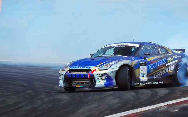 Blue yellow car smoke track free wallpaper - medium preview image