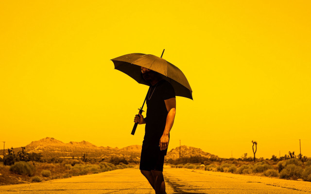 Desert man umbrella gun autumn free wallpaper - medium preview image