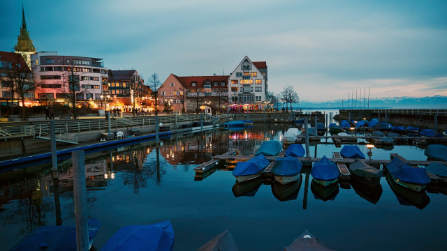 Harbor boats buildings dusk cityscape free wallpaper - medium preview image