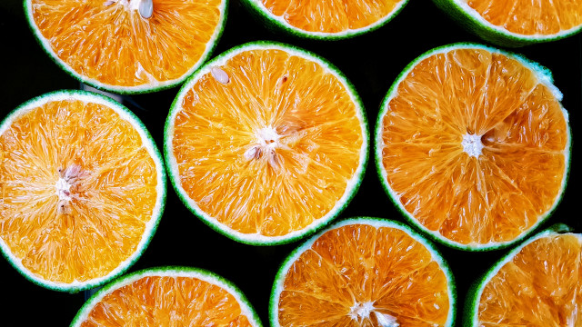 Oranges halved table top black free wallpaper - medium preview image