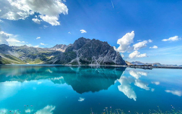 Mountain reflection lake beach sky free wallpaper - medium preview image