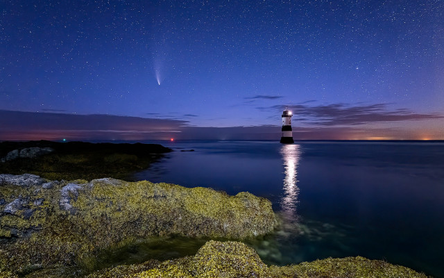 Lighthouse rocky shore night space free wallpaper - medium preview image