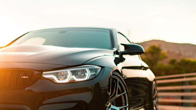 Black car road fence mountain free wallpaper - medium preview image