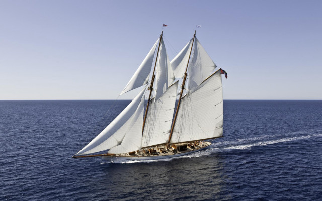 Sailboat open ocean sunny day free wallpaper - medium preview image