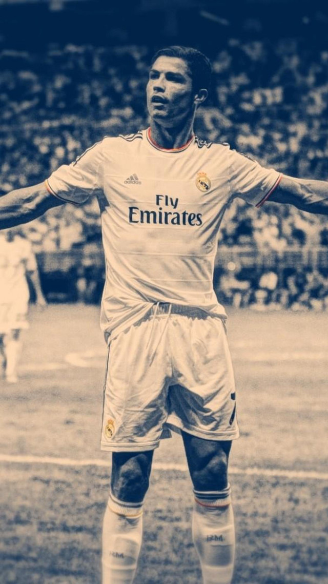 Man standing soccer field arms free wallpaper - medium preview image