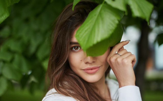 Woman tree ring jewelry blurry free wallpaper - medium preview image