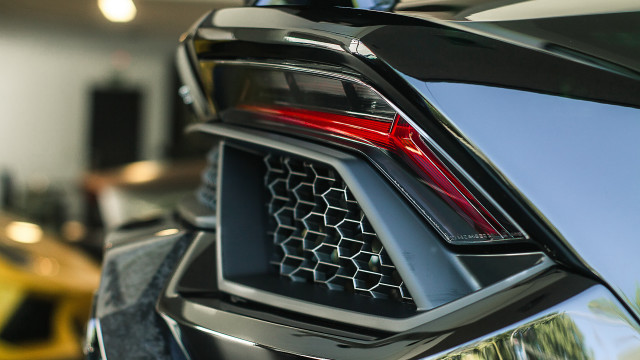Car tail light grilles showroom free wallpaper - medium preview image