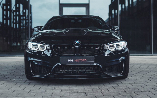 Black car building brick road free wallpaper - medium preview image