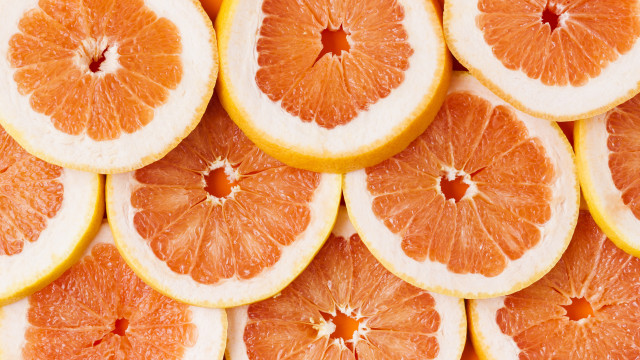Oranges cut half stacked missing free wallpaper - medium preview image