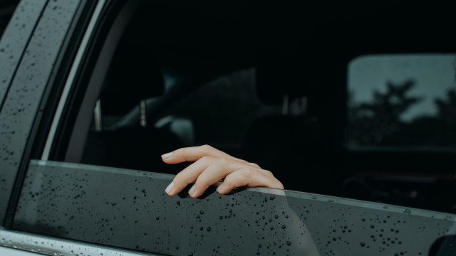 Hand rain drops car window free wallpaper - medium preview image