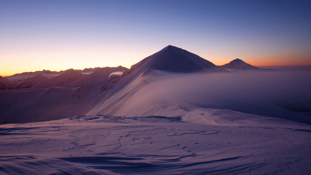 Snowy mountain sunset low cloud free wallpaper - medium preview image