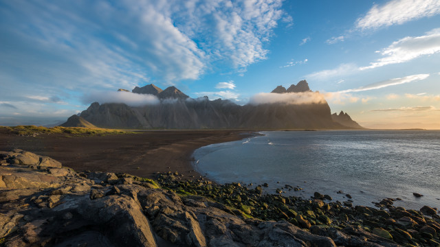 Rocky beach mountain water cloudy free wallpaper - medium preview image