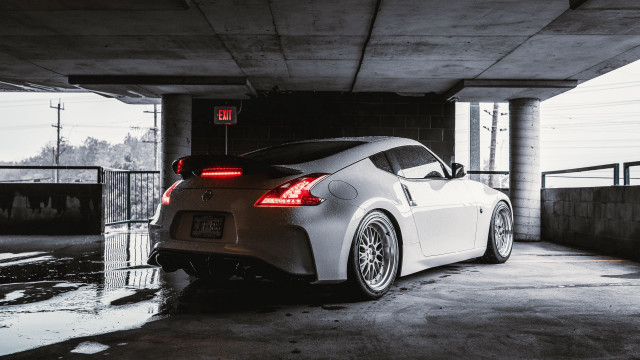 White sports car parking garage #11 free wallpaper - medium preview image