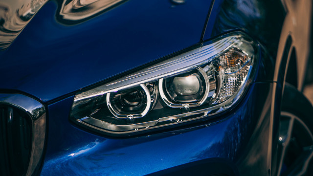 Blue car chrome trim macro free wallpaper - medium preview image