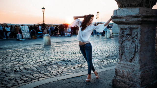 Woman cobblestone street pillar crowd free wallpaper - medium preview image