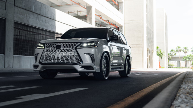 White suv street tall building free wallpaper - medium preview image