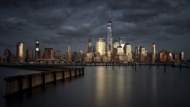 City skyline night water clouds free wallpaper for desktop - medium preview image
