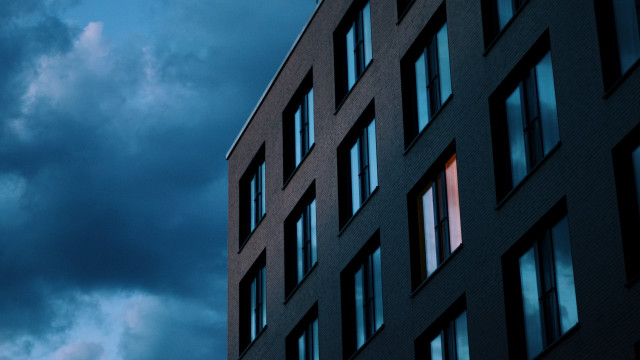 Building clock cloudy sky minimalism free wallpaper - medium preview image