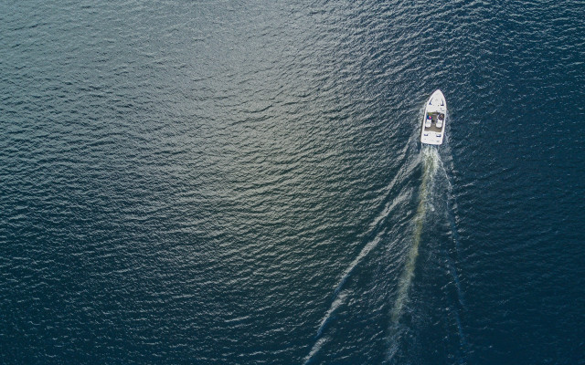 Ocean boat cinematic starry night free wallpaper - medium preview image