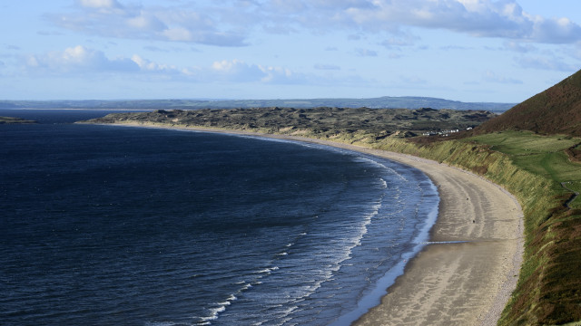 Beach hill water grassy sky free wallpaper - medium preview image