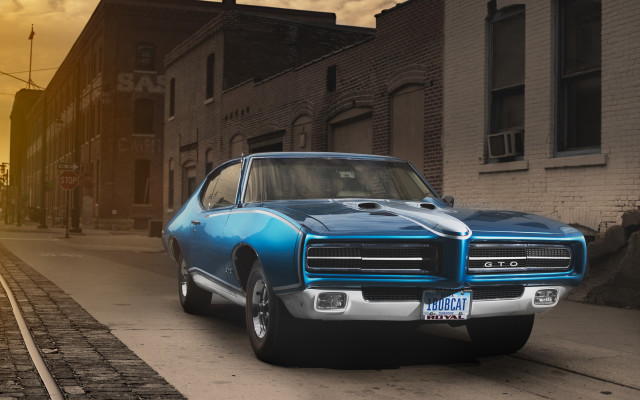 Blue car parked road building #3 free wallpaper - medium preview image