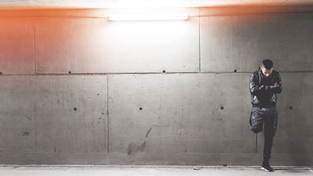 Man standing room cellphone light free wallpaper - medium preview image