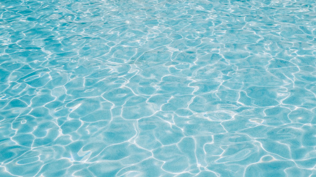 Blue pool white umbrella beach free wallpaper - medium preview image